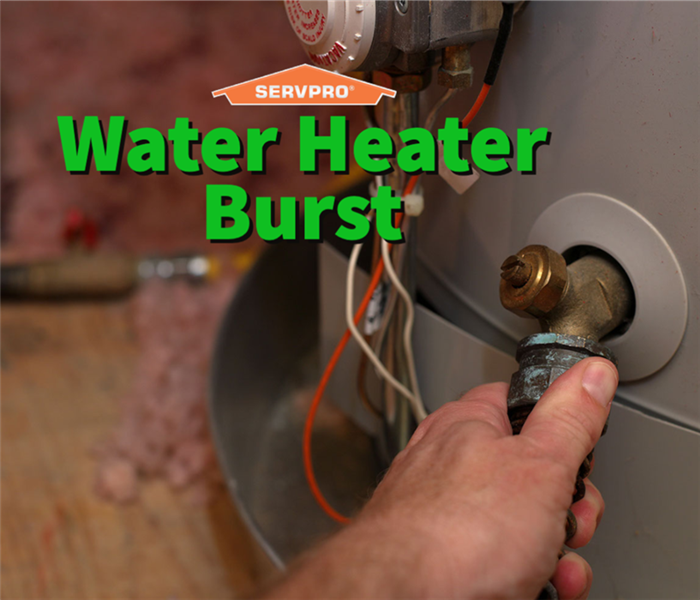 A water heater burst being repaired