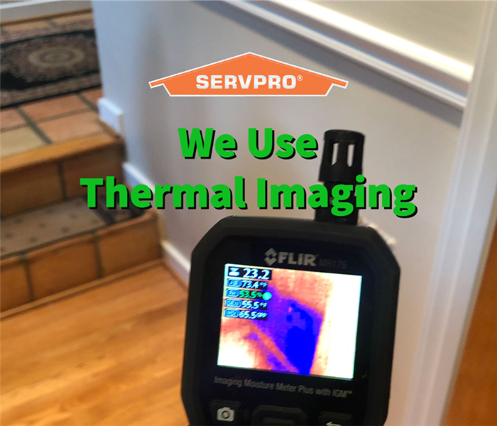 A SERVPRO professional using thermal imaging to detect moisture